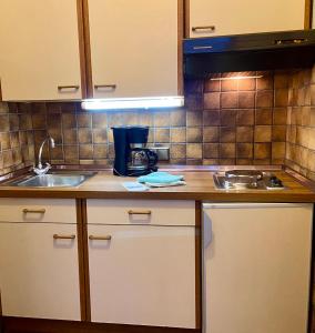 Kuchyň nebo kuchyňský kout v ubytování Haus Dwarslöper, Ferienwohnung 3