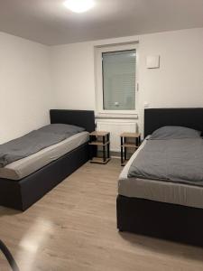 Postel nebo postele na pokoji v ubytování Exklusiv modernisierte Traumwohnung mit High-End-Lüftungssystem