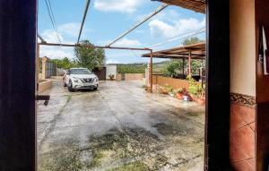 a car parked in a parking lot in a garage at Mirador De Arcos in Arcos de la Frontera +4 photos