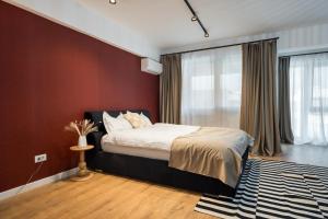 En eller flere senge i et værelse på Ivory Concept Studio 53