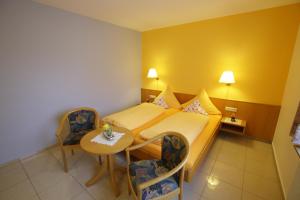 Posezení v ubytování Hotel-Restaurant Gasthof Adler