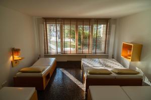 Hinterwies – Ski In / Lodge / Dine客房内的一张或多张床位