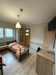 Postel nebo postele na pokoji v ubytování Hostel CENTRUM