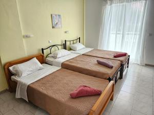 A bed or beds in a room at VILLA ELENA