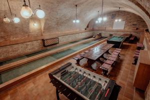 an overhead view of a gym with a swimming pool at Belvárdi Fogadó in Belvárdgyula