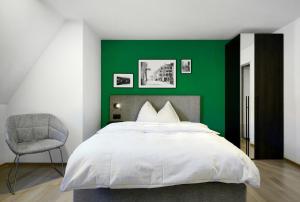 Ένα ή περισσότερα κρεβάτια σε δωμάτιο στο Hotel Zugertor