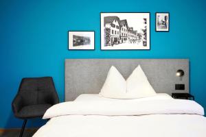 Ένα ή περισσότερα κρεβάτια σε δωμάτιο στο Hotel Zugertor
