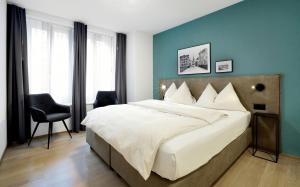 Ένα ή περισσότερα κρεβάτια σε δωμάτιο στο Hotel Zugertor