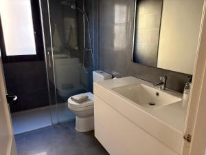 Kúpeľňa v ubytovaní Casita de la playa con parking