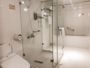 Koupelna v ubytování Doitsu Hotel