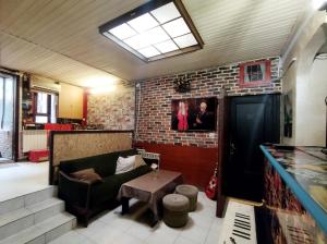TV a/nebo společenská místnost v ubytování Grammy Hostel Residence + 6 fotografií
