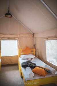 Postel nebo postele na pokoji v ubytování Himalayan Bunker Nubra II
