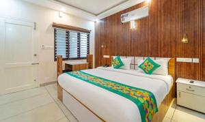 Postel nebo postele na pokoji v ubytování Hotel Le Mount Suit Inn