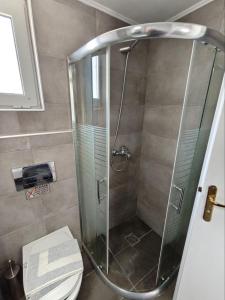 Koupelna v ubytování Karis Hotel