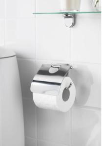 a toilet paper dispenser on a wall in a bathroom at Habitación F in Zaragoza