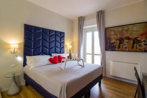 Posteľ alebo postele v izbe v ubytovaní Album Boutique Rooms