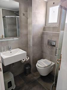 Koupelna v ubytování Karis Hotel + 30 fotografií