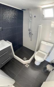 Een badkamer bij Blue View Apartments