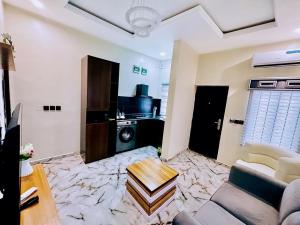 Un televizor și/sau centru de divertisment la LaVintage Apartelle