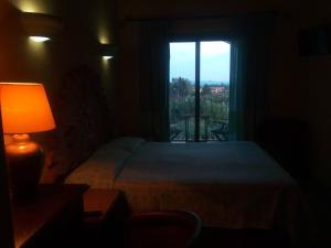 Postel nebo postele na pokoji v ubytování Hotel dell'Ancora