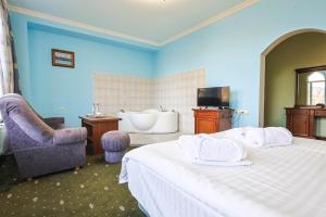 Lalaner Hotel房間的床