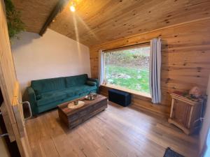 Posezení v ubytování Chalet de l'Abondance + 4 fotografie