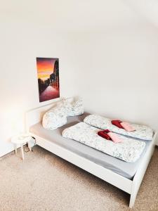 Postel nebo postele na pokoji v ubytování L7 - Urlaubsmagie - Kleine Wohnung am Wanderweg