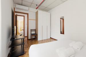 Letto o letti in una camera di GuestHost - M3 Lodi Tibb-Brenta Comfy Flat