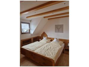 Postel nebo postele na pokoji v ubytování Haus Bachmatt + 17 fotografií