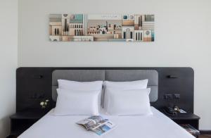 Voodi või voodid majutusasutuse Brown Jerusalem Hotel & Convention Center toas