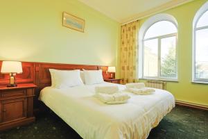 Lalaner Hotel房間的床
