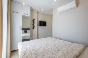 Ένα ή περισσότερα κρεβάτια σε δωμάτιο στο Jasmin 8 2+1 NEW! +16 φωτογραφίες