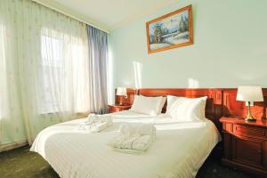 Lalaner Hotel房間的床