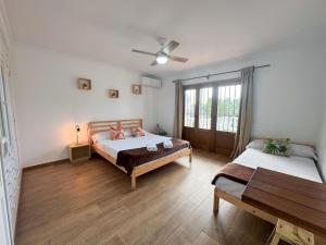A bed or beds in a room at Villa Lucía - Benalmádena Costa