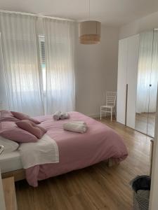Postel nebo postele na pokoji v ubytování La Casa di Ary