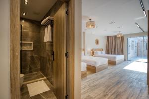 A bed or beds in a room at Beyond Pyramids View