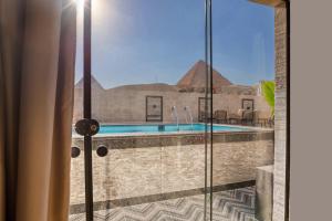 The swimming pool at or close to Beyond Pyramids View