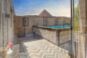 The swimming pool at or close to Beyond Pyramids View