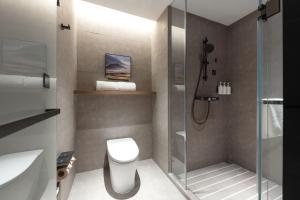 Baðherbergi á Atour Hotel Tianjin Tiankai Huayuan Industrial Park