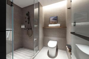 Baðherbergi á Atour Hotel Tianjin Tiankai Huayuan Industrial Park
