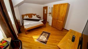 Postel nebo postele na pokoji v ubytování Transylvania Hills