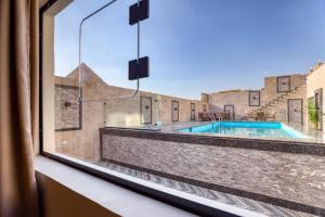 The swimming pool at or close to Beyond Pyramids View