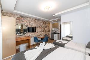 TV a/nebo společenská místnost v ubytování T-Square Residence