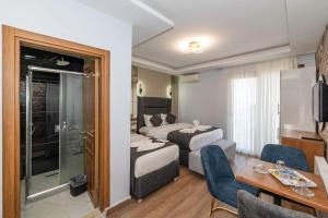 TV a/nebo společenská místnost v ubytování T-Square Residence