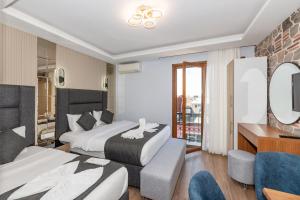 Posezení v ubytování T-Square Residence