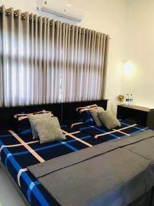 Postel nebo postele na pokoji v ubytování Hawana Home Stay + 37 fotografií
