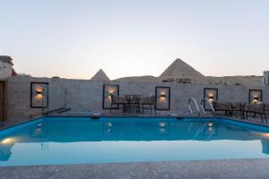The swimming pool at or close to Beyond Pyramids View