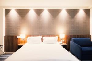 Postel nebo postele na pokoji v ubytování Holiday Inn Express Lille Centre by IHG