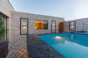 The swimming pool at or close to Beyond Pyramids View