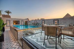 The swimming pool at or close to Beyond Pyramids View